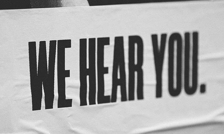 Banner that reads "we hear you"