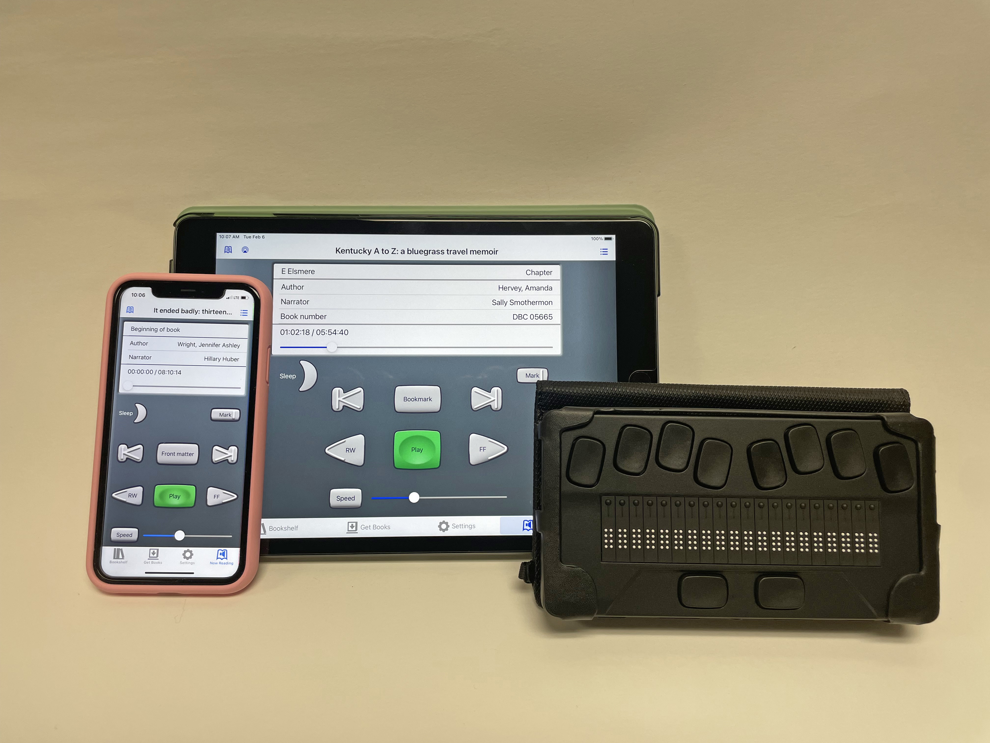 an ipad and iphone showing the BARD mobile app on their screens and a braille eReader.